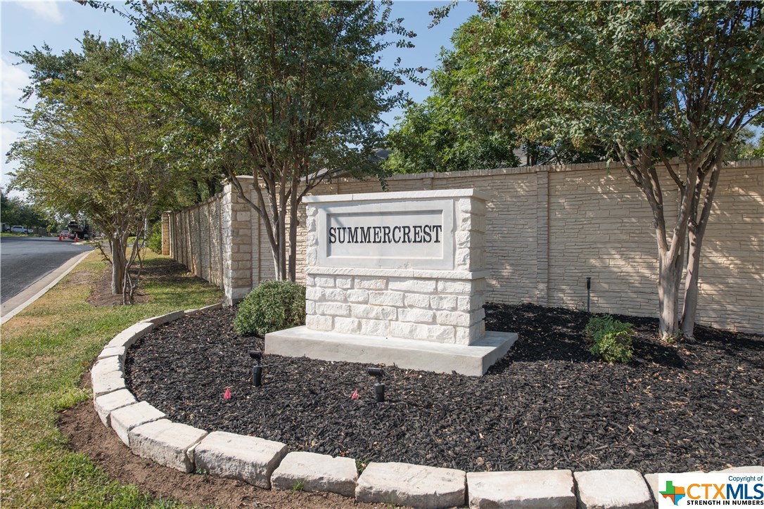2406 Edgecliff Path Georgetown, TX 78626 - Photo 1 of 1 a sign that is sitting in front of a white house