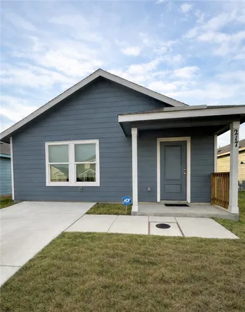 a house view with a garden space
