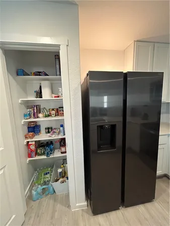 a bedroom with bed and window