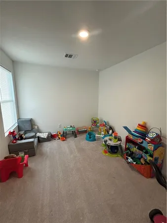 a close view of stove and cabinets