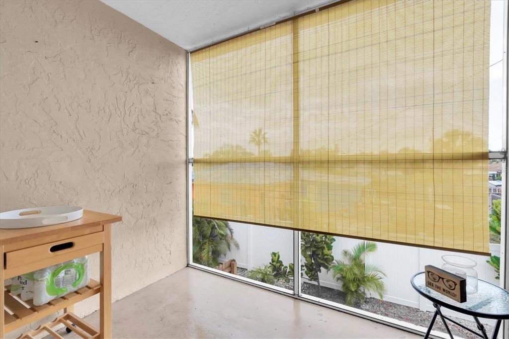 8800 Blind Pass Road, Unit 10 St. Pete Beach, FL 33706 - Photo 14 of 24 a view of a balcony with chair