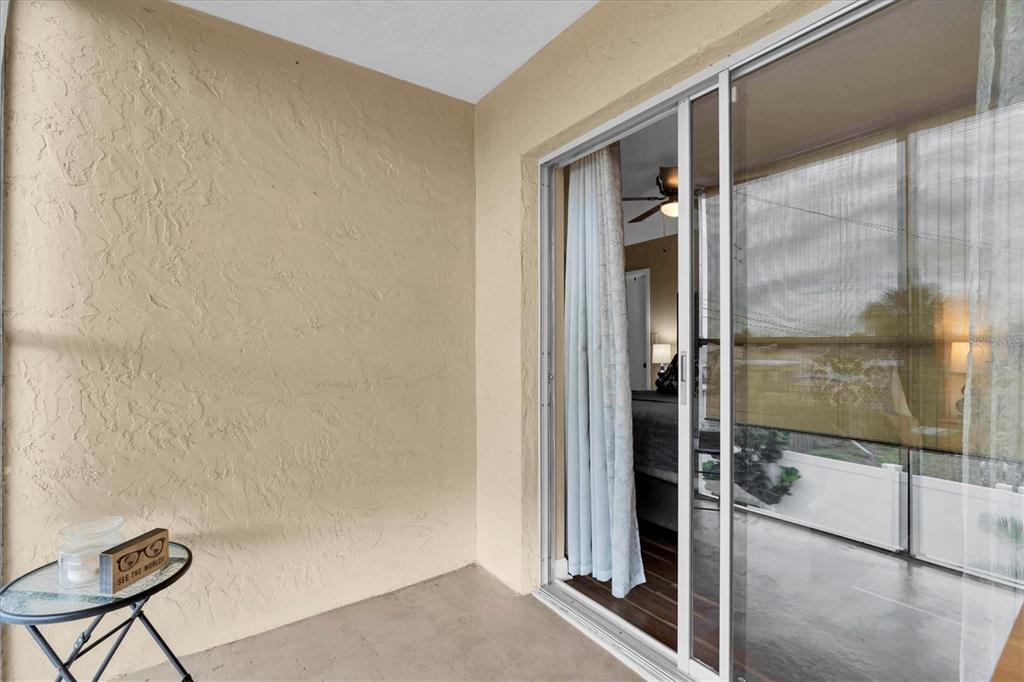 8800 Blind Pass Road, Unit 10 St. Pete Beach, FL 33706 - Photo 15 of 24 a bathroom with a glass shower door