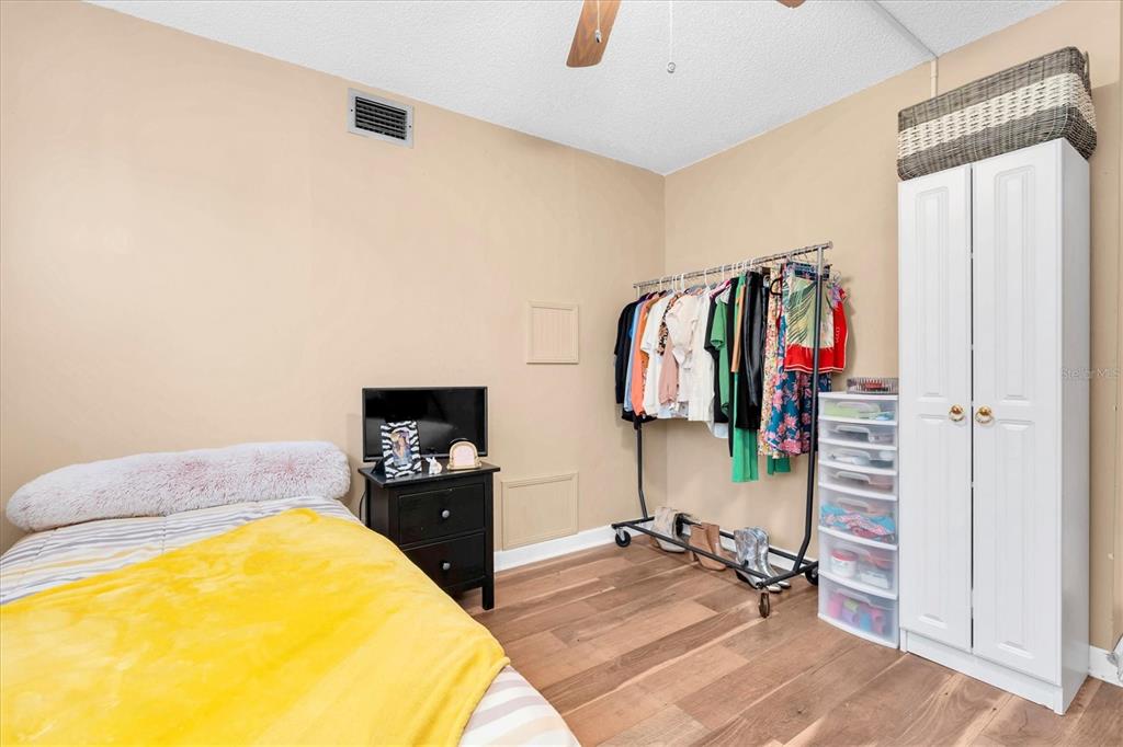 8800 Blind Pass Road, Unit 10 St. Pete Beach, FL 33706 - Photo 18 of 24 a view of a room with gym equipment