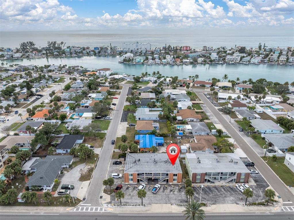 8800 Blind Pass Road, Unit 10 St. Pete Beach, FL 33706 - Photo 20 of 24 an aerial view of a city