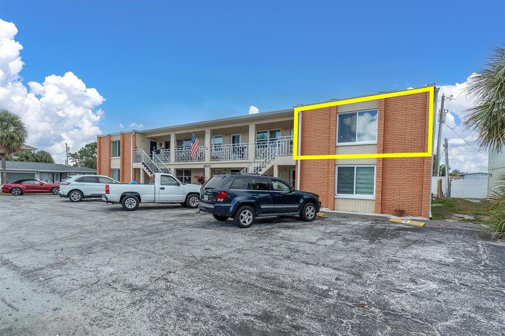 8800 Blind Pass Road, Unit 10 St. Pete Beach, FL 33706 - Photo 23 of 24 a view of car parked in front of house