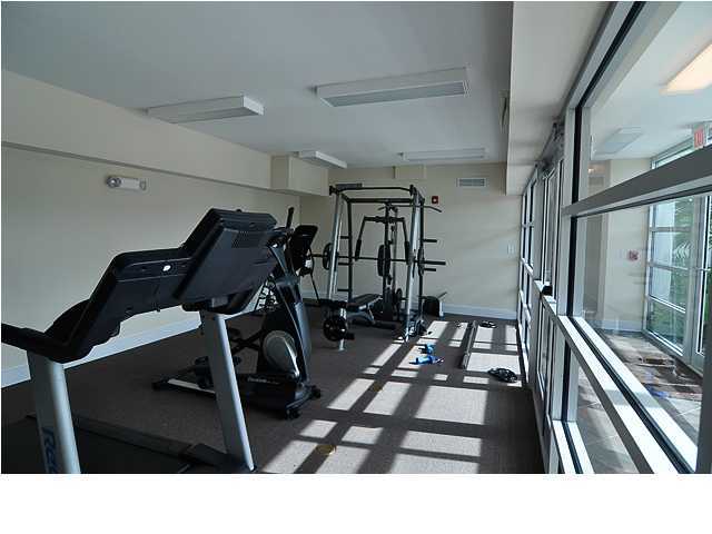 211 Durango Road, Unit 416 Destin, FL 32541 - Photo 34 of 34 a room with lots of chairs and mirrors