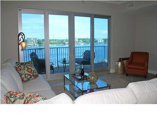 211 Durango Road, Unit 416 Destin, FL 32541 - Photo 4 of 34 a living room with furniture and floor to ceiling windows