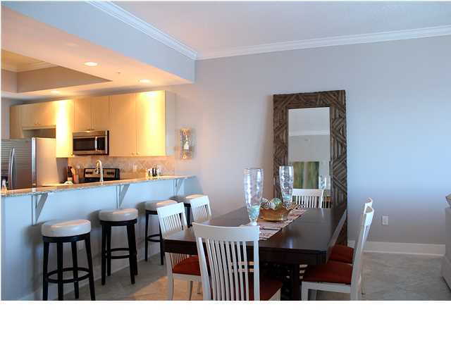 211 Durango Road, Unit 416 Destin, FL 32541 - Photo 9 of 34 a open dining room with furniture and window
