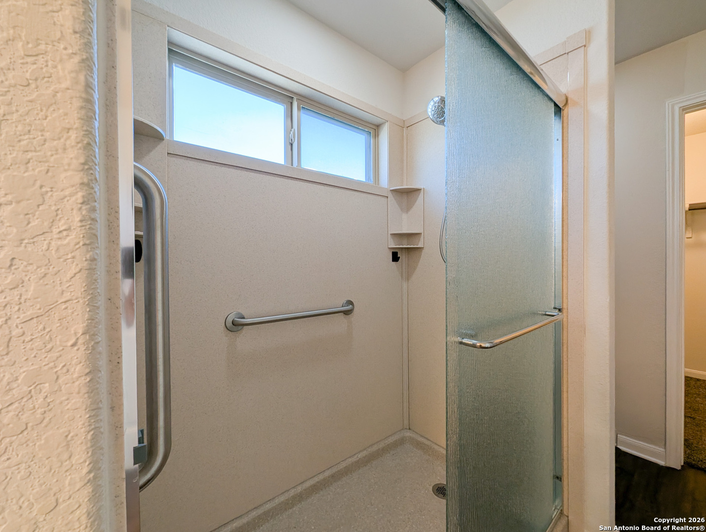 2494 McCrae New Braunfels, TX 78130 - Photo 13 of 22 a bathroom with a glass shower door