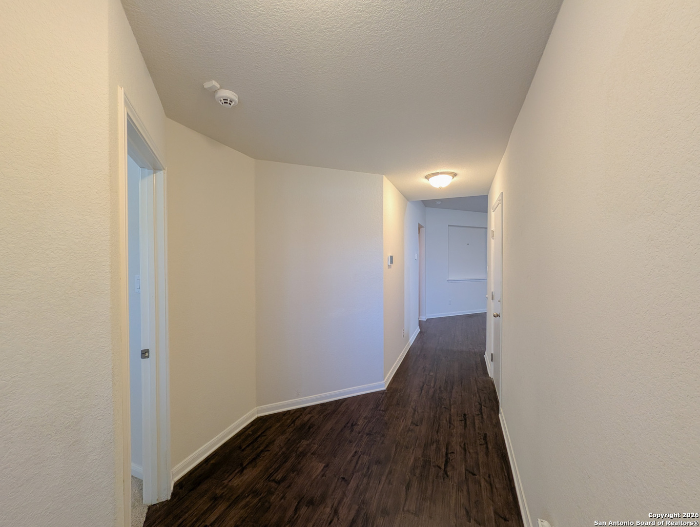 2494 McCrae New Braunfels, TX 78130 - Photo 3 of 22 a view of hallway with wooden floor