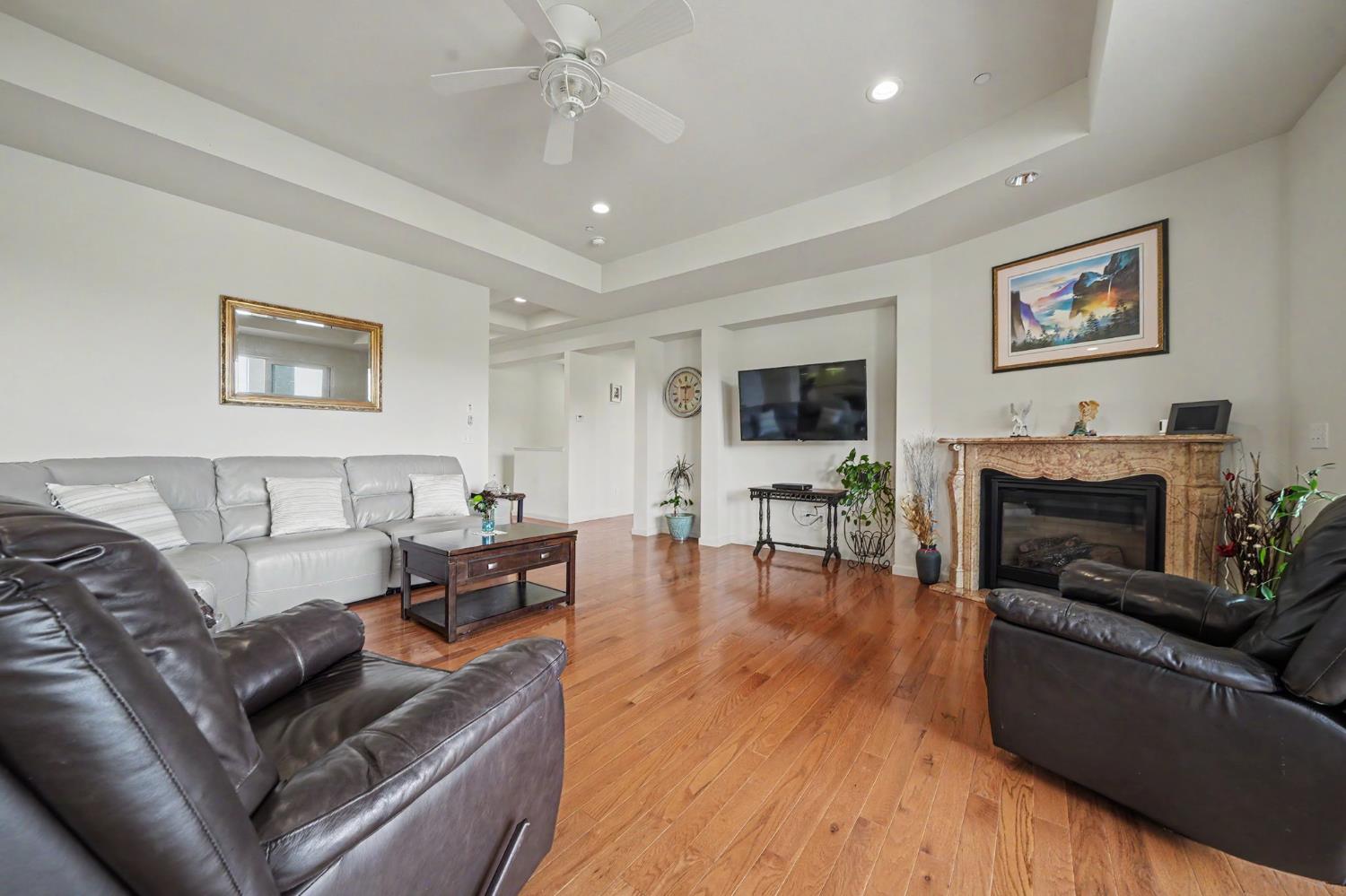6066 Bluff View Road Copperopolis, CA 95228 - Photo 23 of 96 a living room with furniture and a fireplace
