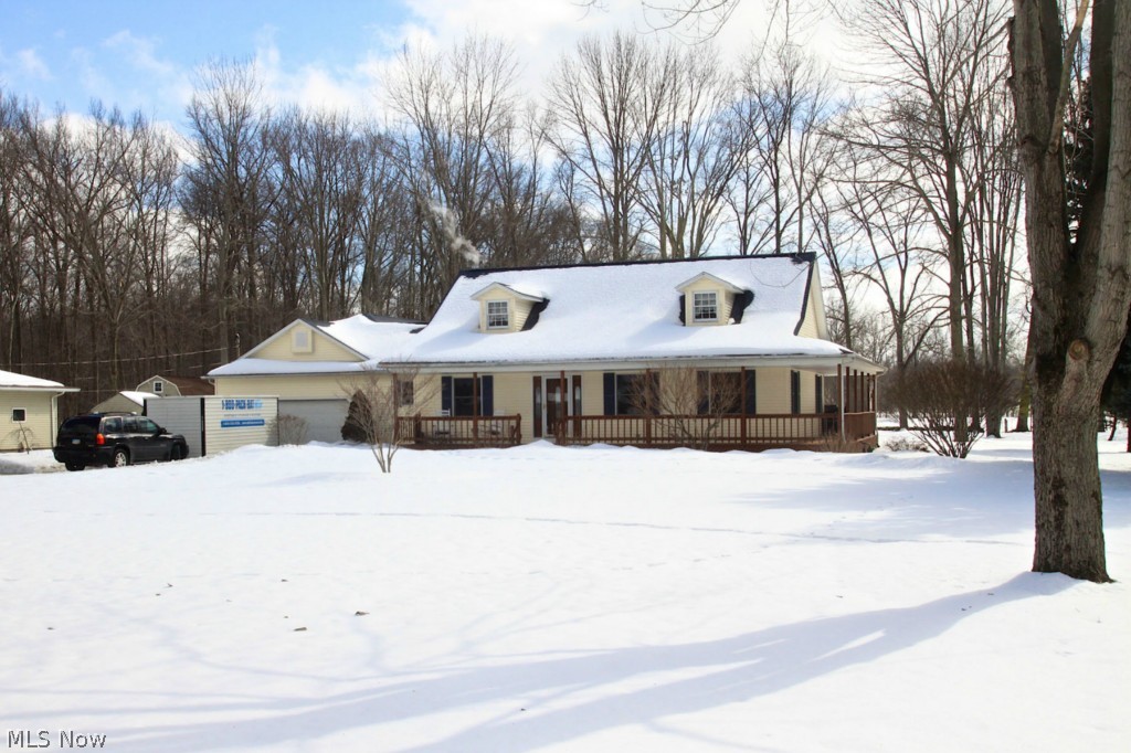 38557 Otten Road North Ridgeville, OH 44039 - Photo 1 of 25 Welcome to 38557 Otten Road! Wraparound porch connects to expansive rear deck.