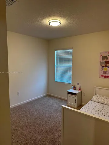 a room with a desk and chair