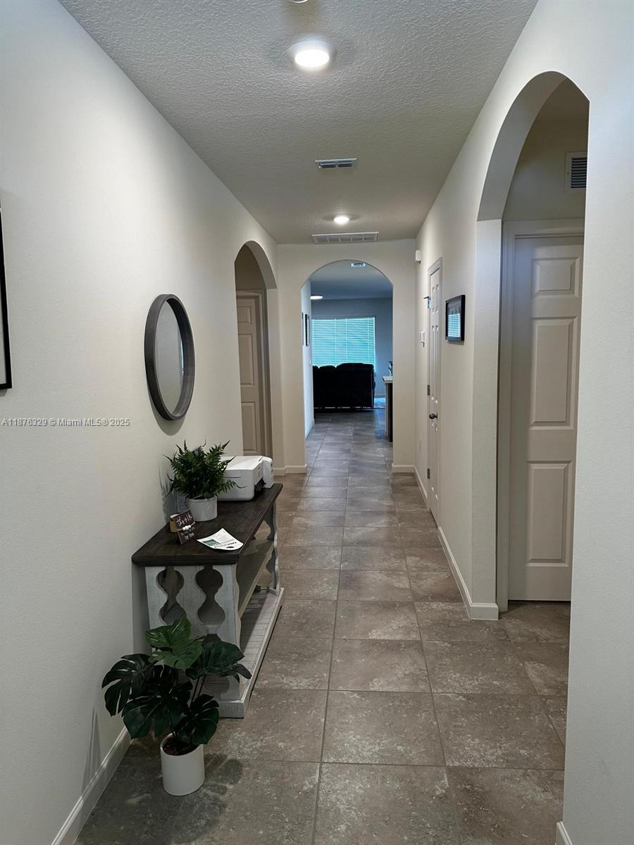 2098 Southwest Altman Avenue Port St. Lucie, FL 34953 - Photo 7 of 27 a living room with furniture