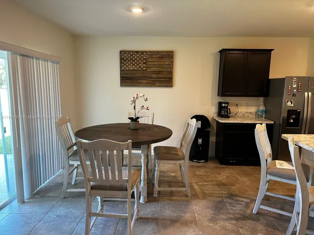 a table and chairs in a room