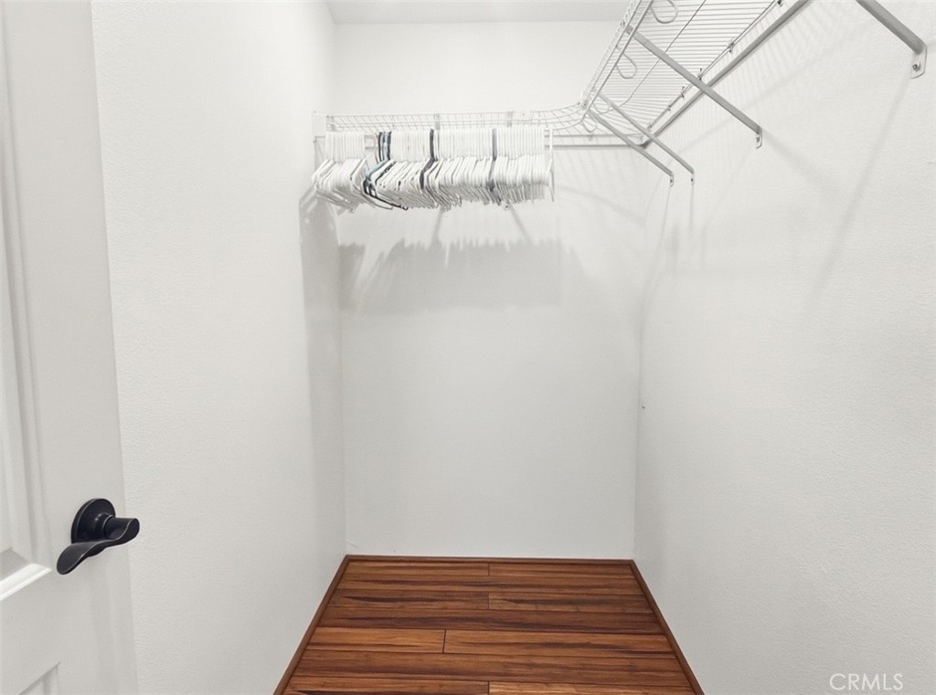 18070 Langlois Road Desert Hot Springs, CA 92241 - Photo 11 of 14 a view of a room with racks on the wall