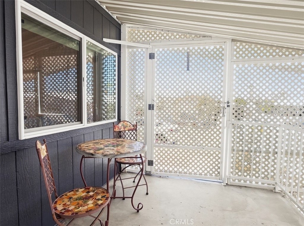 18070 Langlois Road Desert Hot Springs, CA 92241 - Photo 3 of 14 a view of a porch with furniture