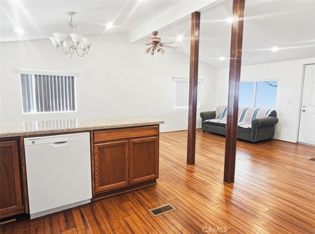 18070 Langlois Road Desert Hot Springs, CA 92241 - Photo 5 of 14 a view of a living room and hardwood floor