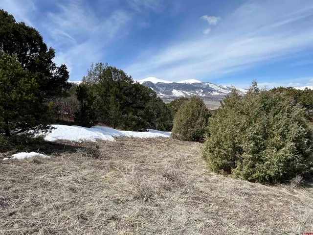 a view of mountain view with mountains in the background