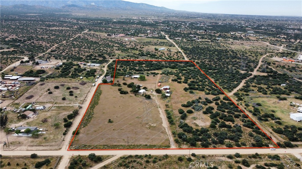 8288 White Phelan, CA 92371 - Photo 3 of 5 an aerial view of residential houses with outdoor space