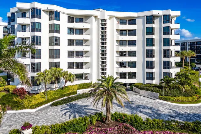 a view of swimming pool with outdoor seating