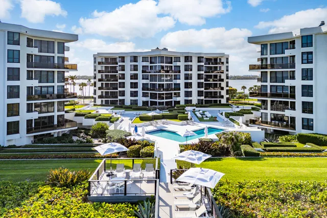 a balcony with furniture and wooden floor