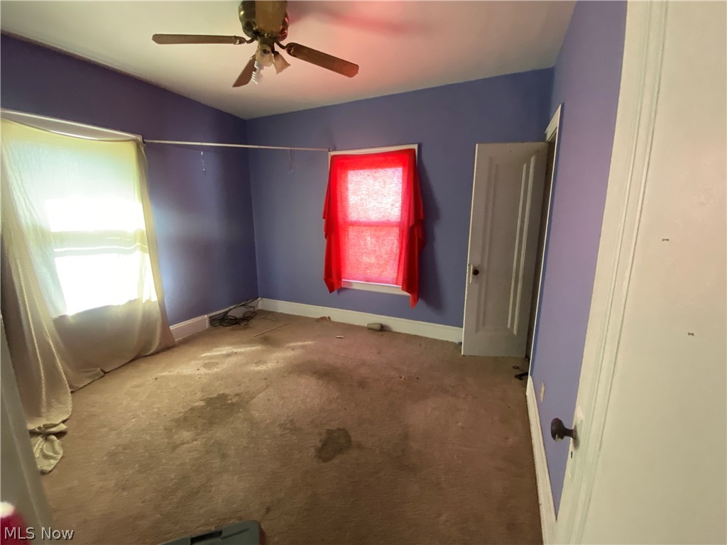 3634 Hildana Road Cleveland, OH 44120 - Photo 8 of 11 Upstairs bedroom 1 with ceiling fan, and a healthy amount of sunlight