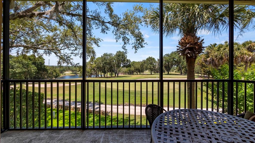 23 Camino Real, Unit 23 Howey-in-the-Hills, FL 34737 - Photo 2 of 46 a view of a black gate