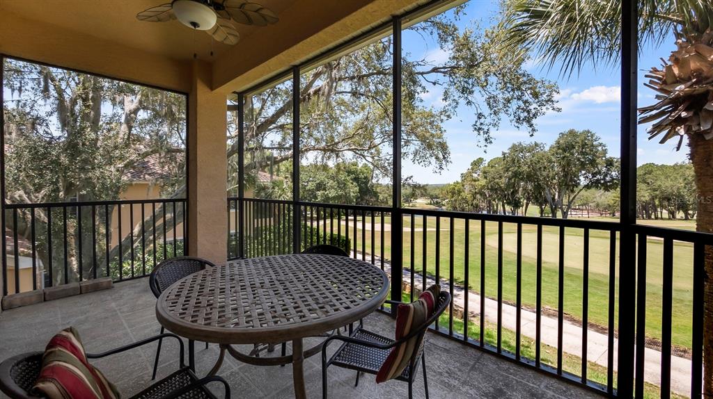 23 Camino Real, Unit 23 Howey-in-the-Hills, FL 34737 - Photo 29 of 46 a view of a balcony with furniture