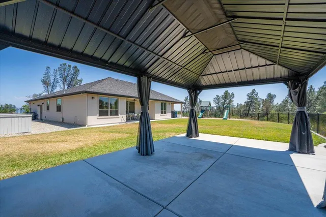 a view of swimming pool with a backyard