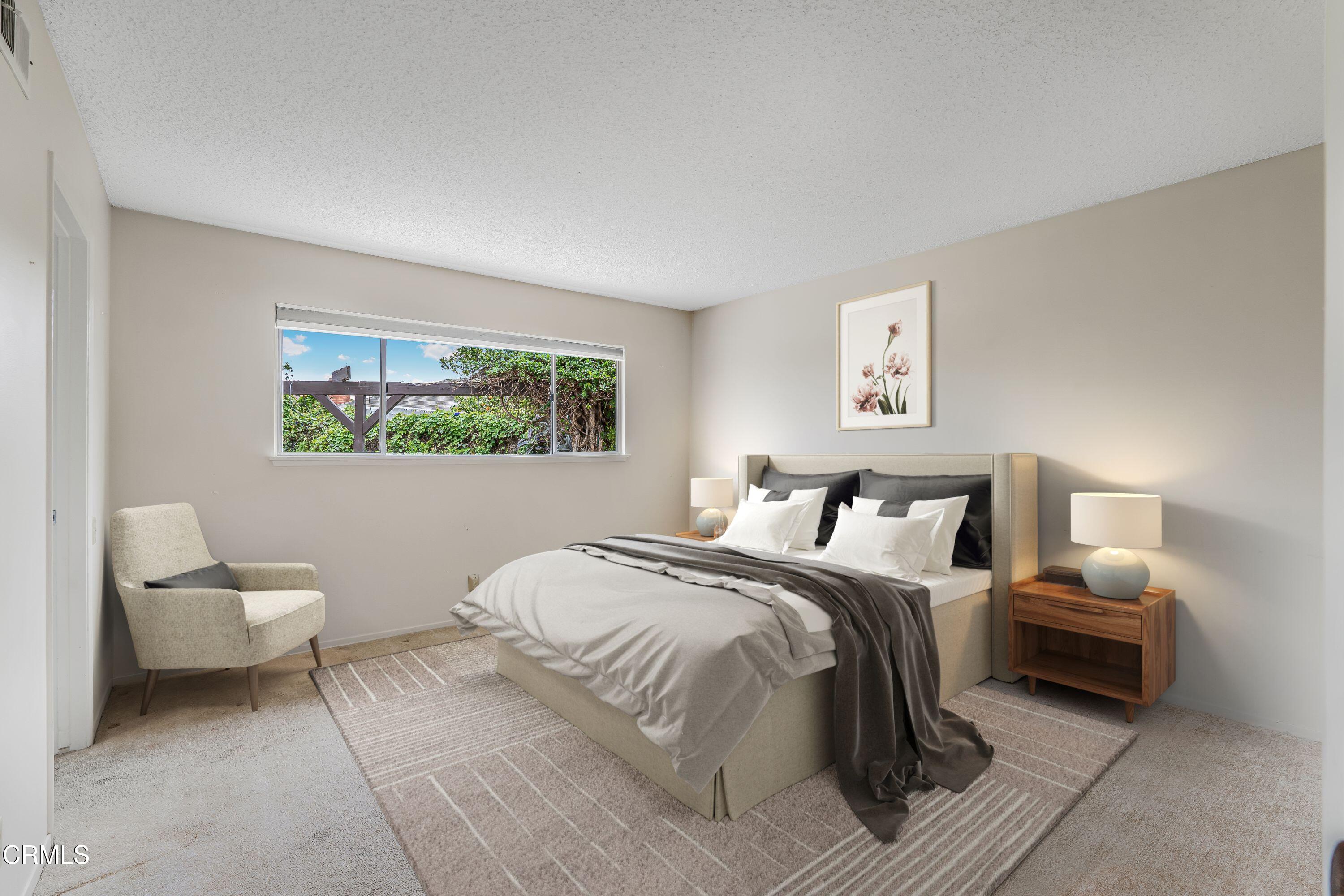 1738 Abbott Avenue Camarillo, CA 93010 - Photo 14 of 36 a bedroom with a bed and a couch