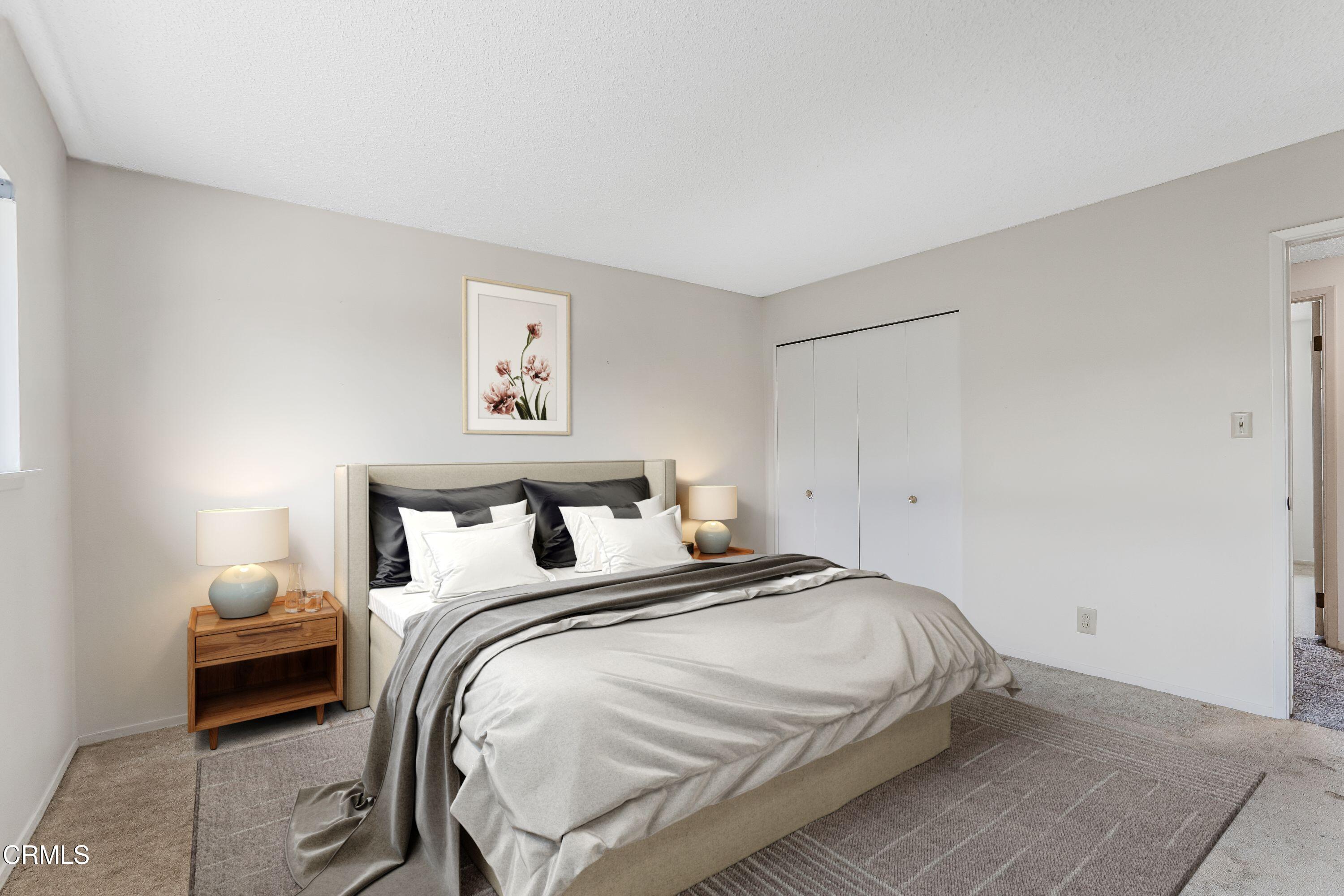 1738 Abbott Avenue Camarillo, CA 93010 - Photo 15 of 36 a bedroom with a bed and a lamp with the table