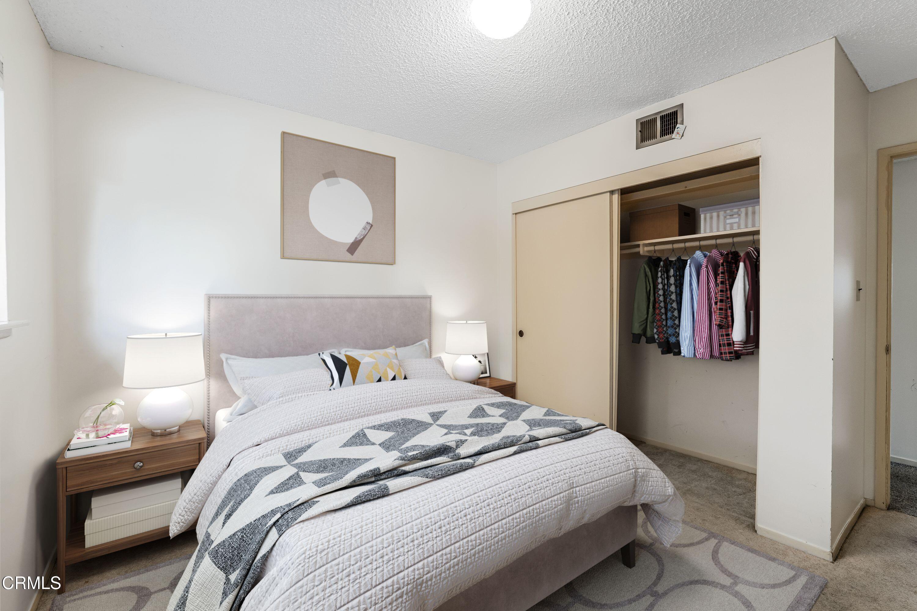 1738 Abbott Avenue Camarillo, CA 93010 - Photo 17 of 36 a bedroom with a bed and cabinet