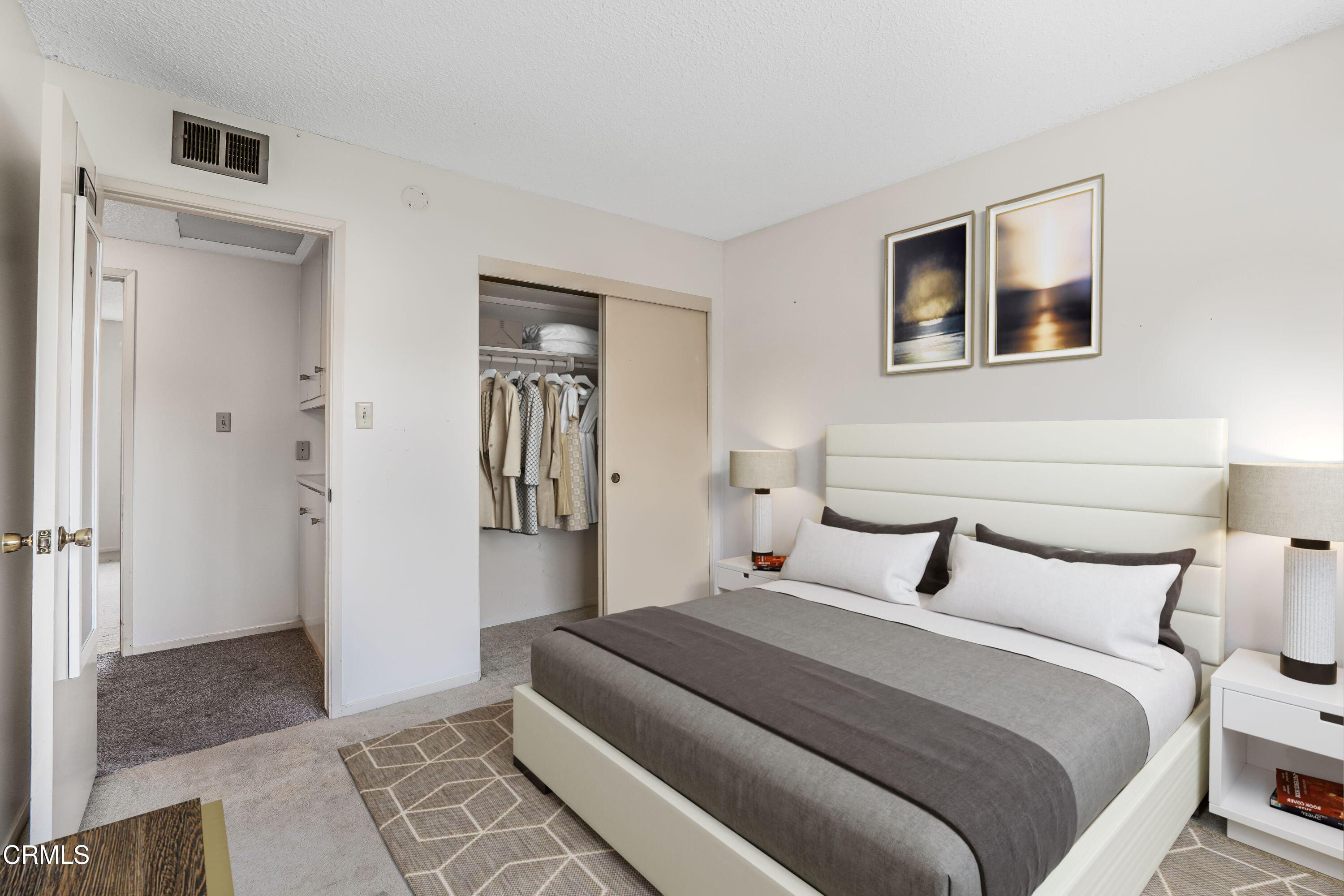 1738 Abbott Avenue Camarillo, CA 93010 - Photo 20 of 36 a bedroom with a bed and cabinets