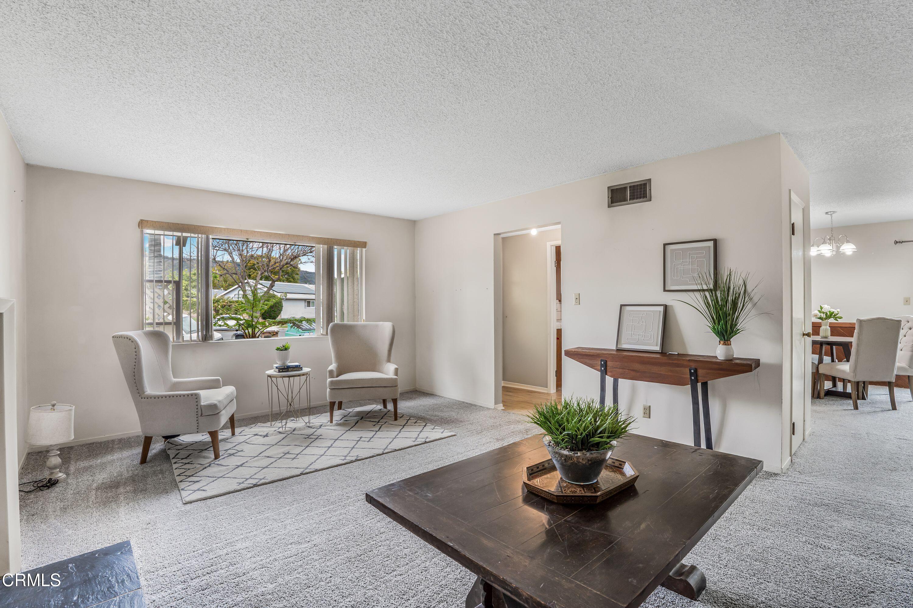 1738 Abbott Avenue Camarillo, CA 93010 - Photo 6 of 36 a living room with furniture rug and window