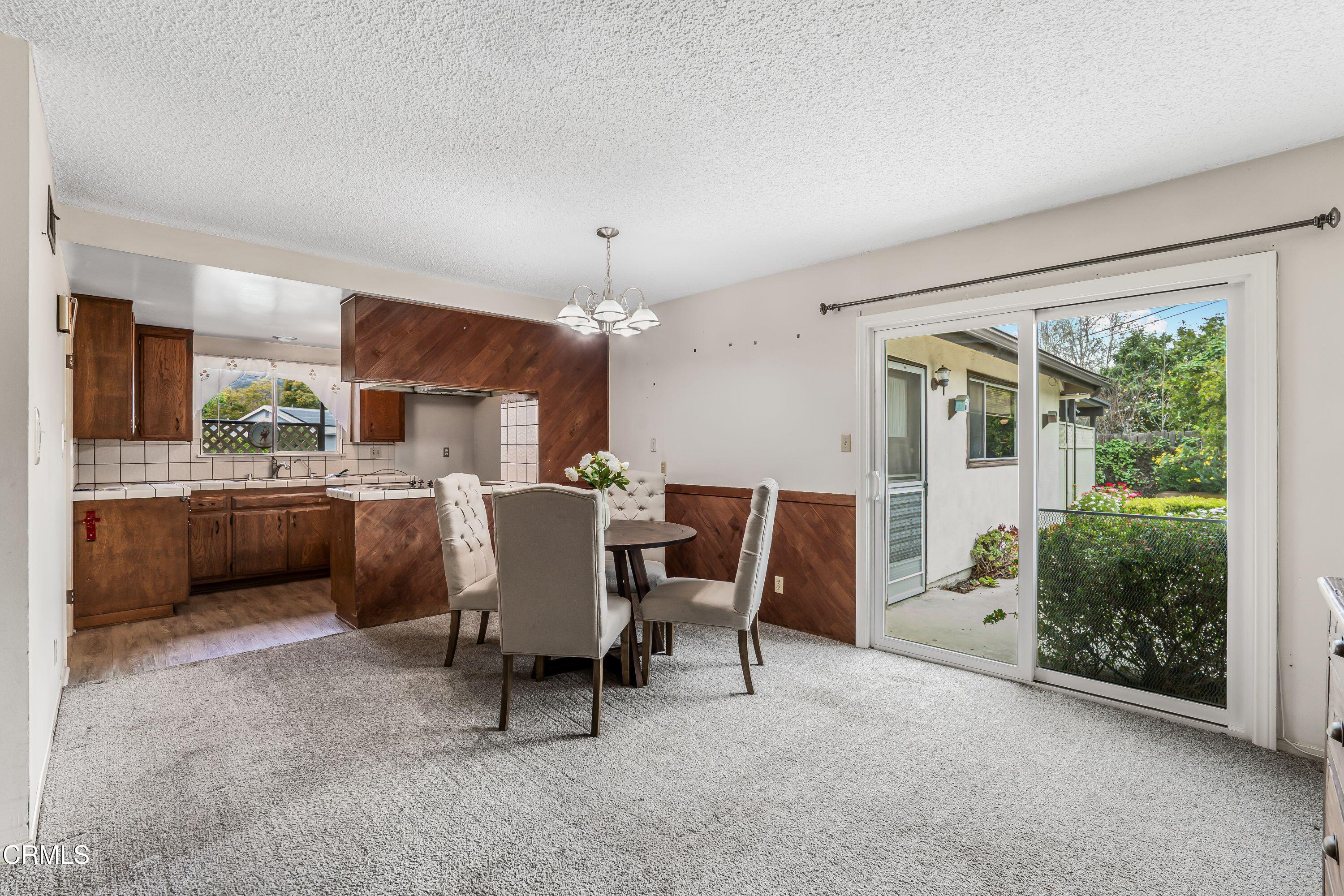 1738 Abbott Avenue Camarillo, CA 93010 - Photo 9 of 36 a living room with furniture a window and a table