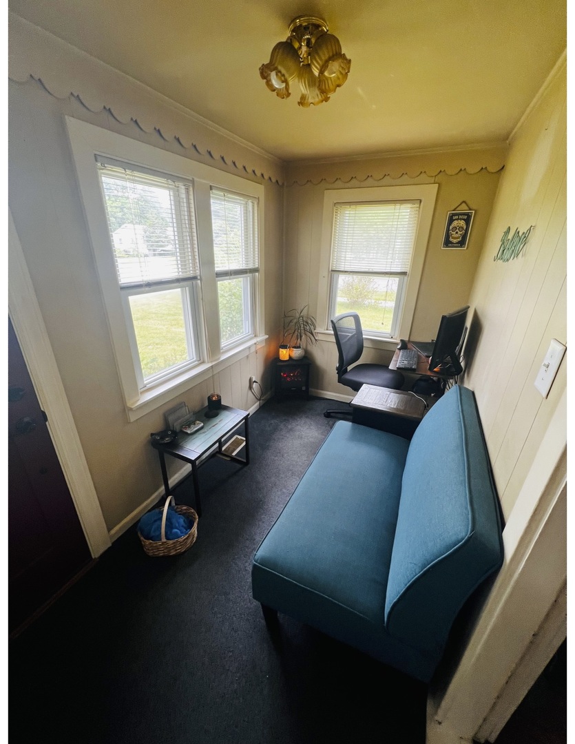 205 West Harrison Road Lombard, IL 60148 - Photo 12 of 26 a living room with furniture and a window