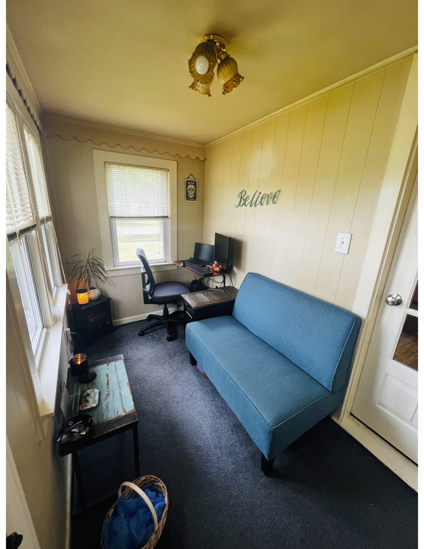 205 West Harrison Road Lombard, IL 60148 - Photo 13 of 26 a living room with furniture and a window