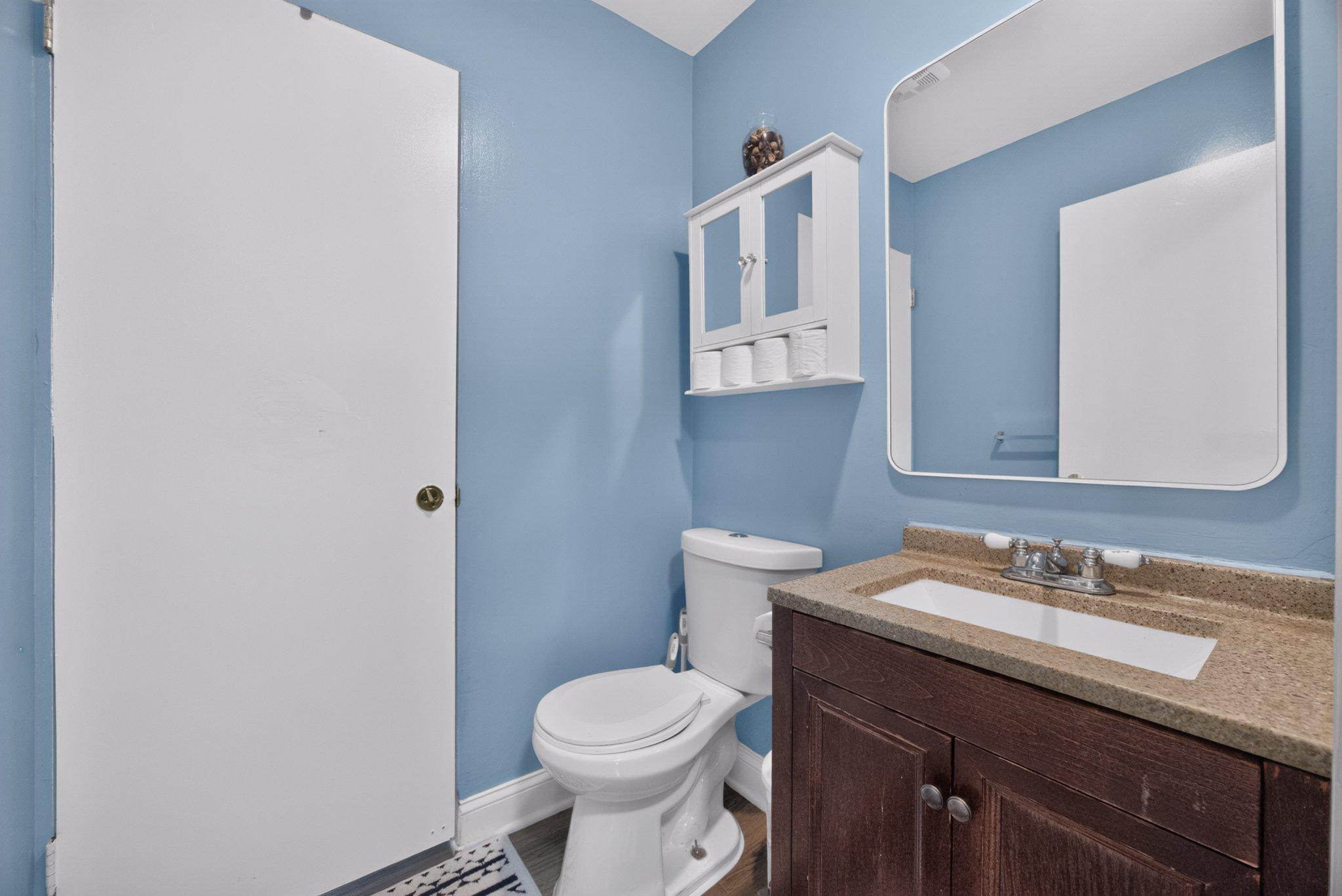 2106 North Rolling Road Windsor Mill, MD 21244 - Photo 18 of 24 Half bath in hallway