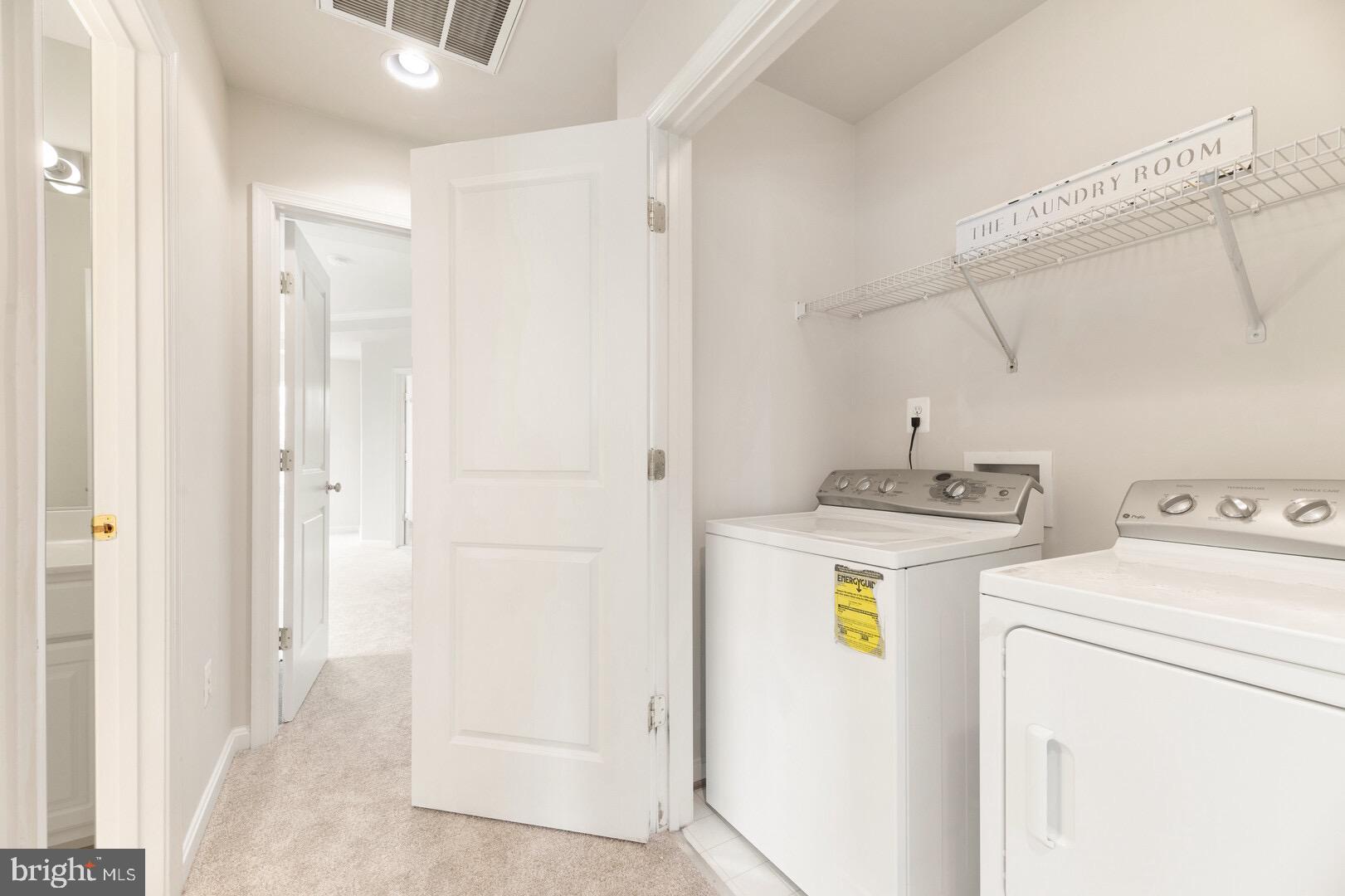 9057 Ribbon Falls Loop Bristow, VA 20136 - Photo 29 of 39 Upper Level Laundry