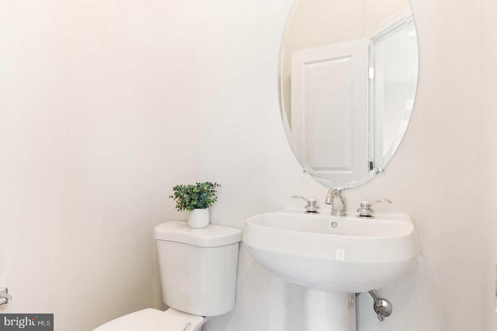 9057 Ribbon Falls Loop Bristow, VA 20136 - Photo 6 of 39 Half Bath on Main Level