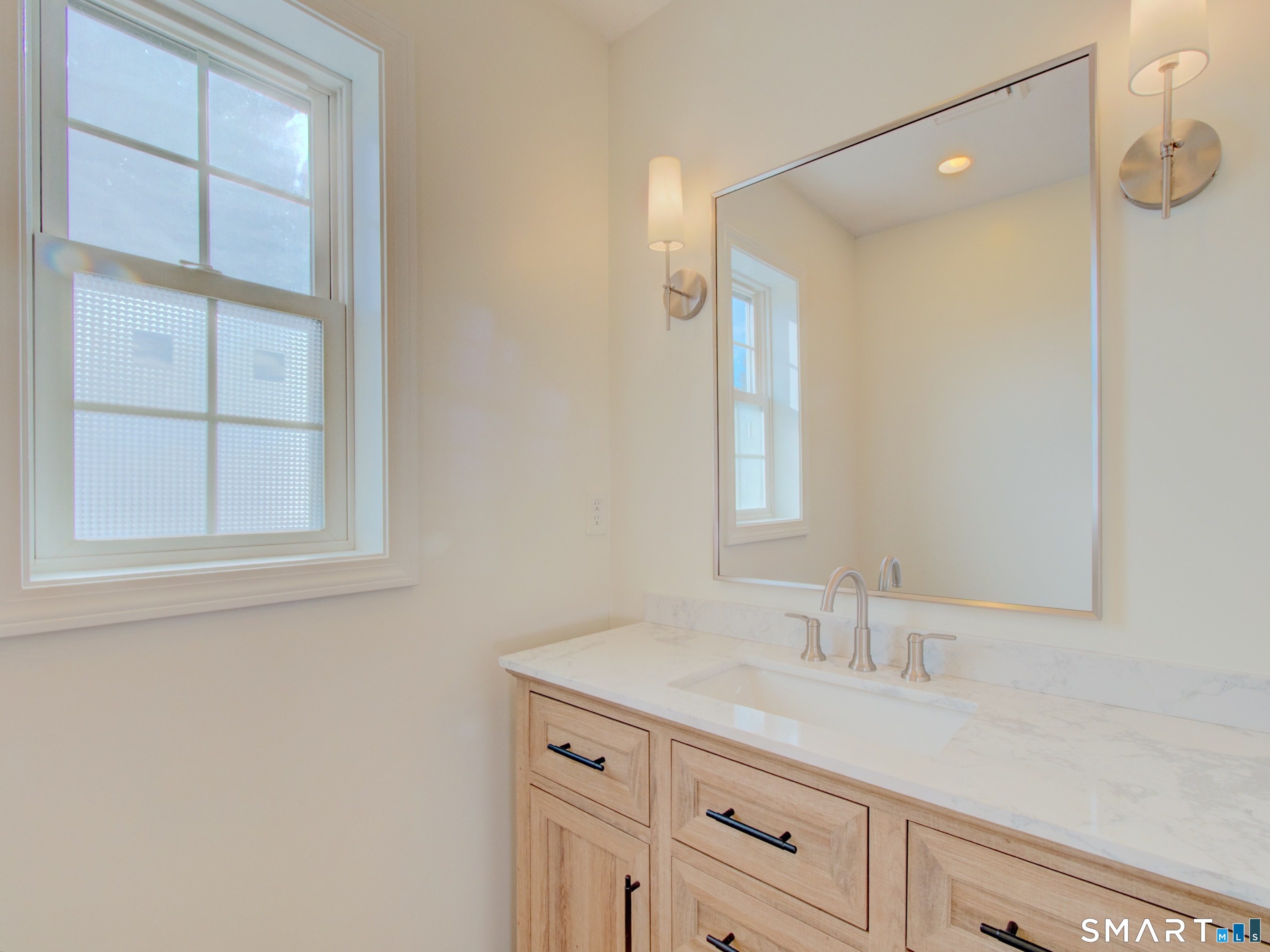 55 Tuckie Road Windham, CT 06280 - Photo 14 of 17 a bathroom with a sink and a mirror