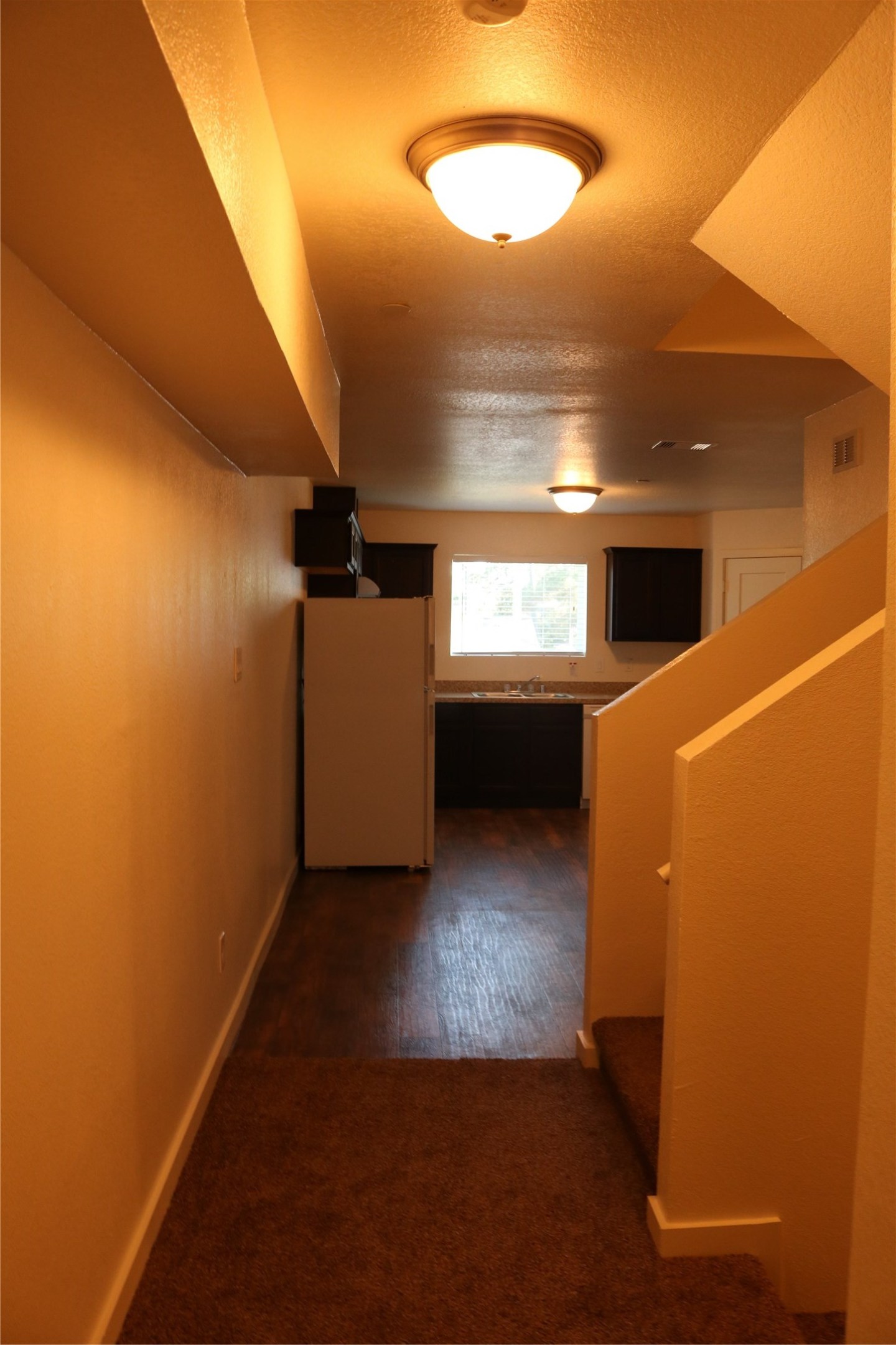 10535 Mills Road, Unit 9C Houston, TX 77070 - Photo 25 of 48 a view of an empty room with a window