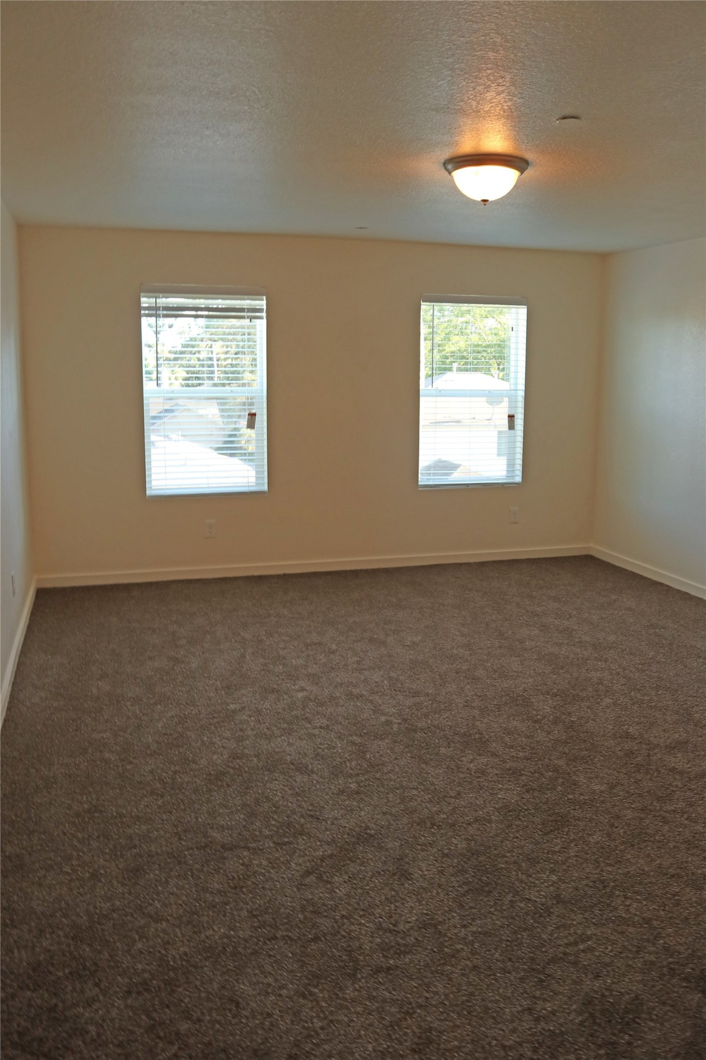 10535 Mills Road, Unit 9C Houston, TX 77070 - Photo 37 of 48 an empty room with a window