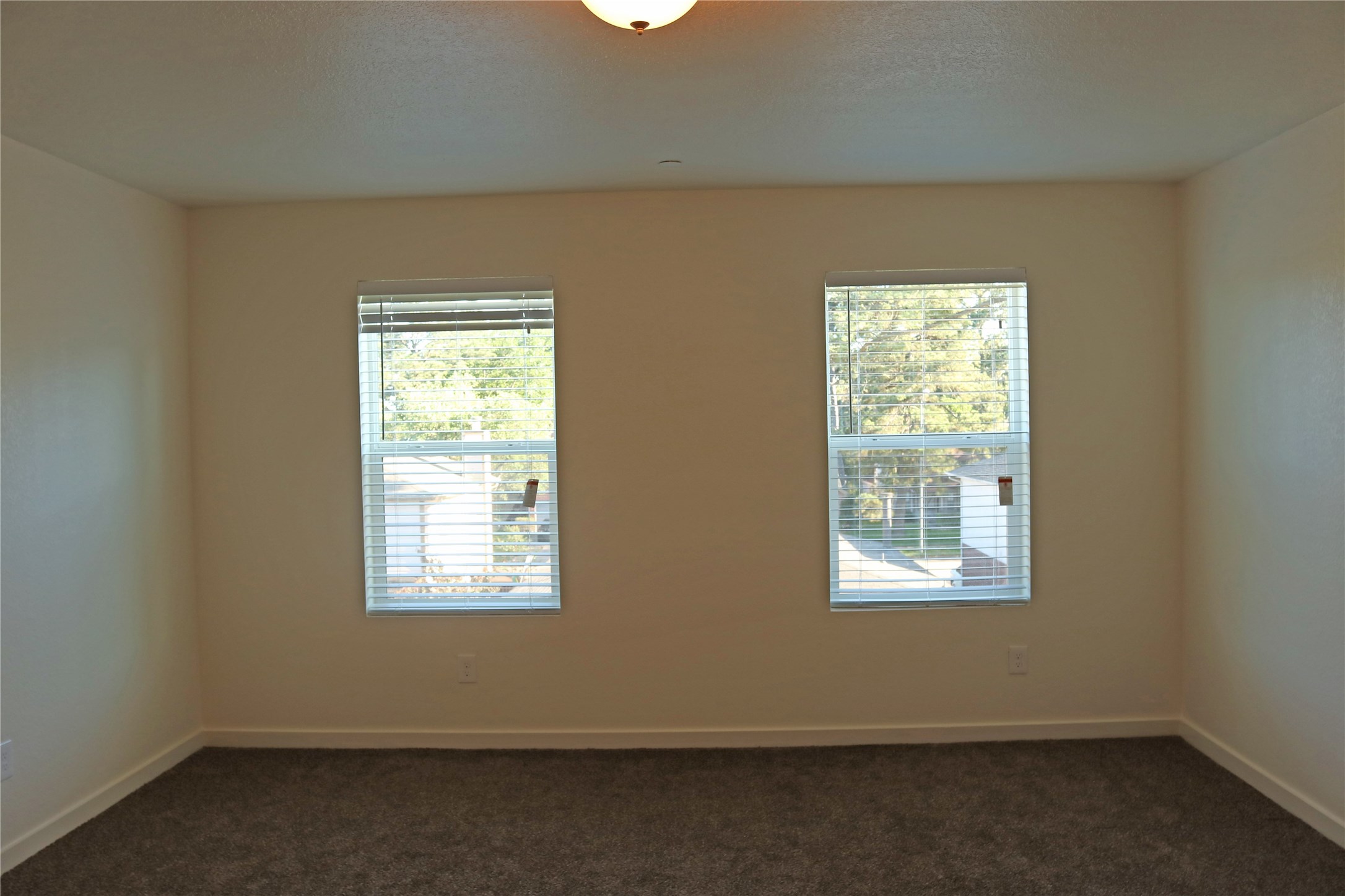 10535 Mills Road, Unit 9C Houston, TX 77070 - Photo 43 of 48 an empty room with a window