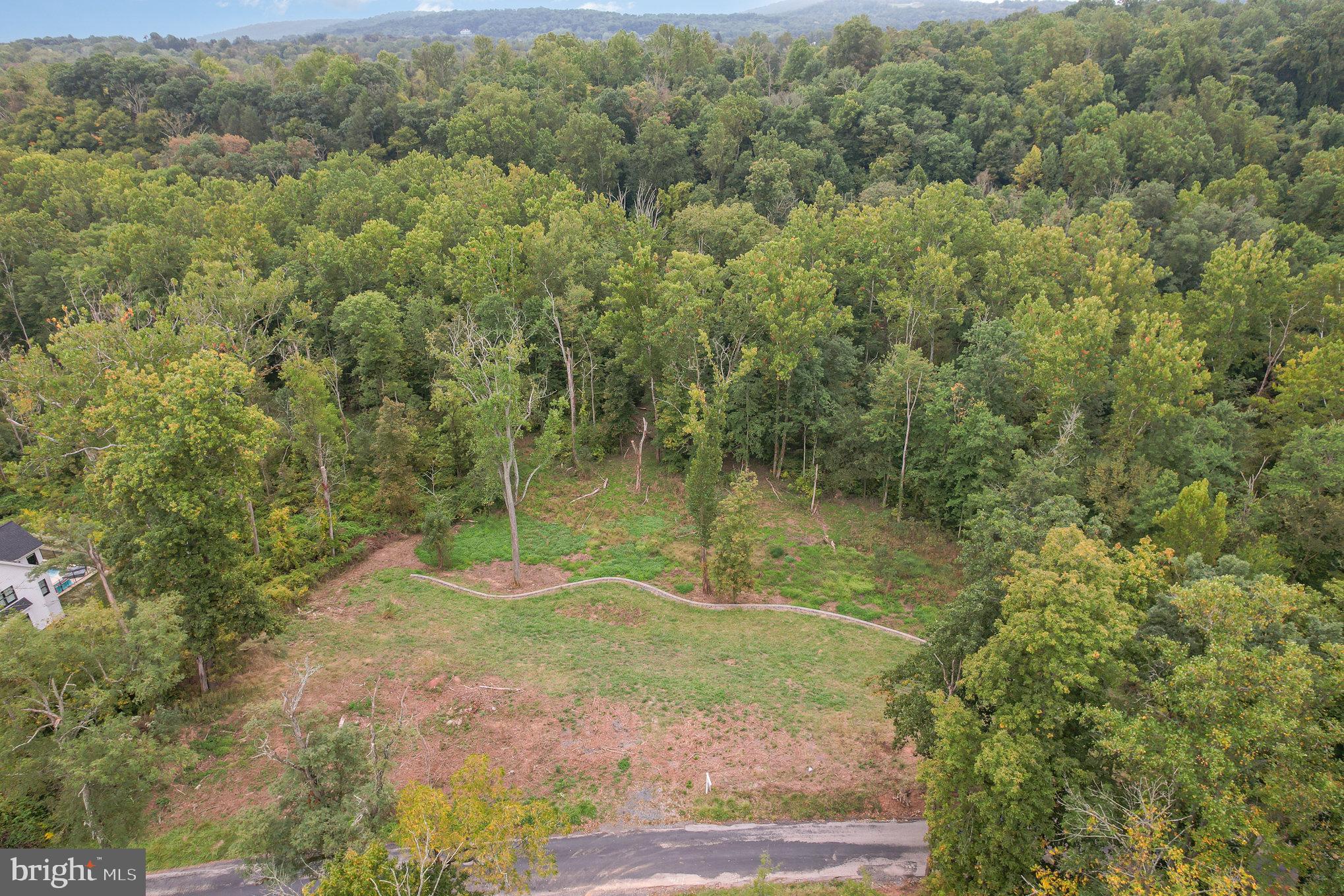 1130 McCormick Road Mechanicsburg, PA 17055 - Photo 2 of 14 a view of a lake with a mountain