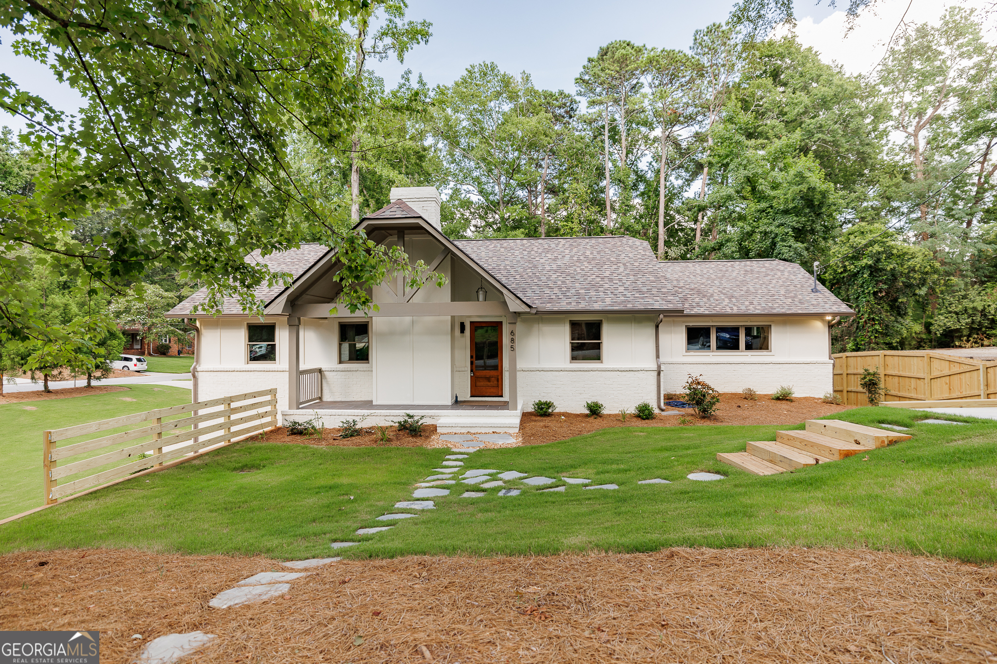 685 Pinecrest Drive Athens, GA 30605 - Photo 1 of 1 a front view of a house with a yard and trees