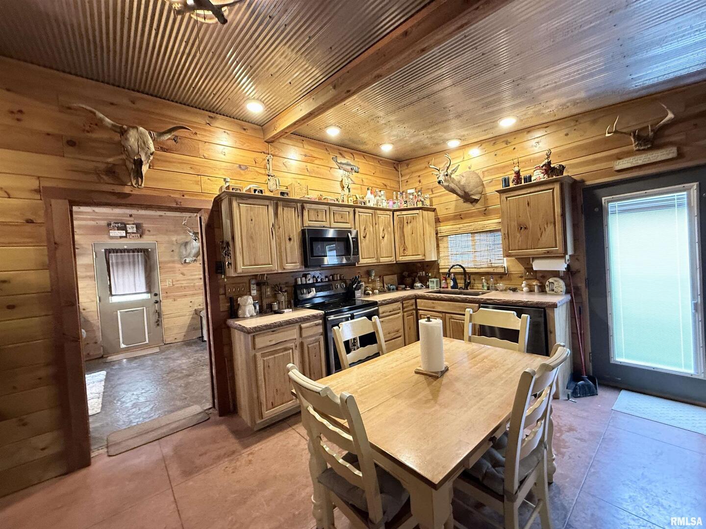 5435 Hickory Ridge Road Pomona, IL 62975 - Photo 17 of 77 a kitchen with cabinets and stainless steel appliances