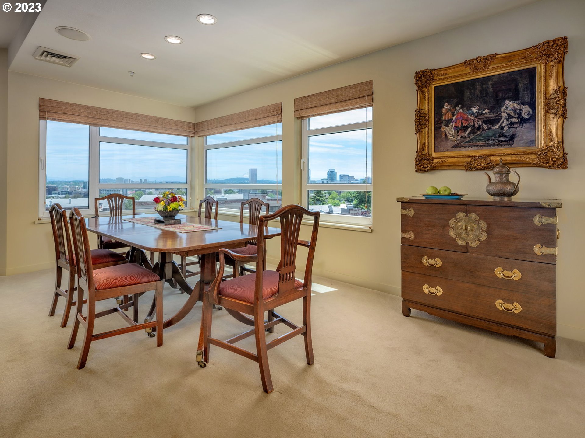 2445 Northwest Westover Road, Unit 411 Portland, OR 97210 - Photo 13 of 38 a view of a dining room with furniture window and outside view
