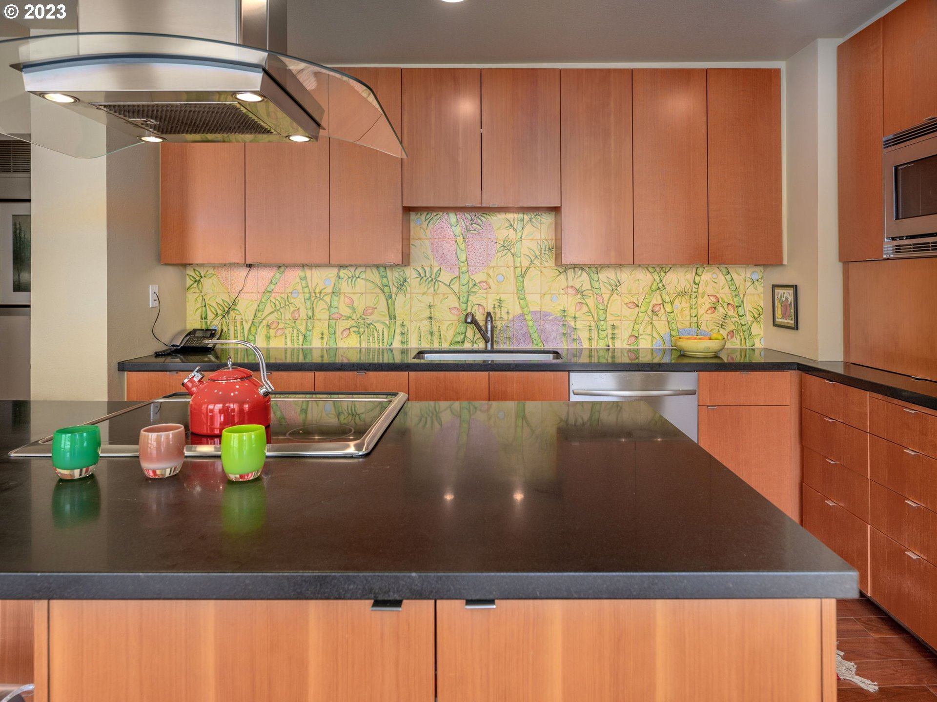 2445 Northwest Westover Road, Unit 411 Portland, OR 97210 - Photo 17 of 38 a view of a kitchen with a sink and cabinets